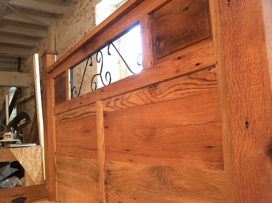 Reclaimed Barnwood Platform Bed with Wrought Iron Detail