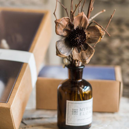 Natural Dried Flower Branches in Glass Bottle