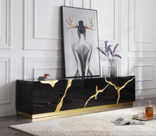 Load image into Gallery viewer, Modrest Aspen - Modern Black &amp; Gold TV Stand

